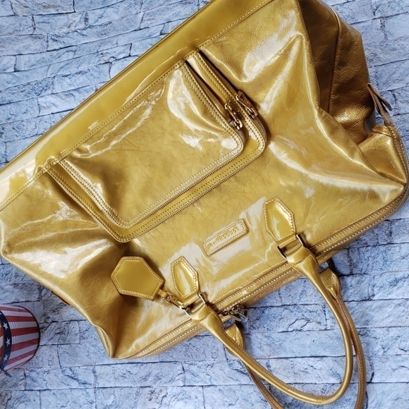 𝅺LONGCHAMP TRAVEL weekender gold/yellow patent leather satchel gold hardware. - Picture 1 of 17